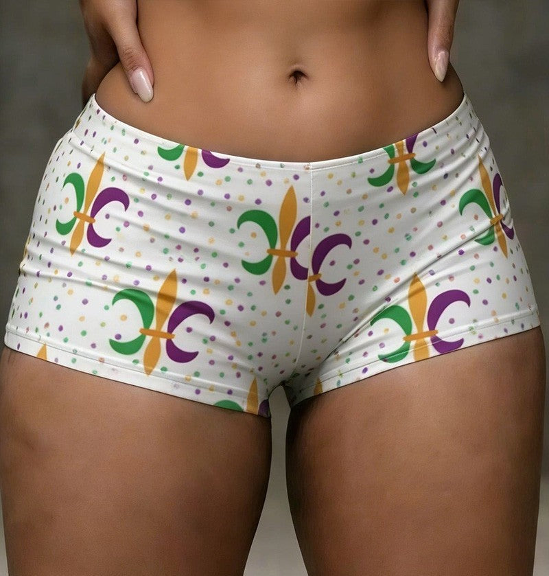 White shorts with colorful patterns on a neutral background