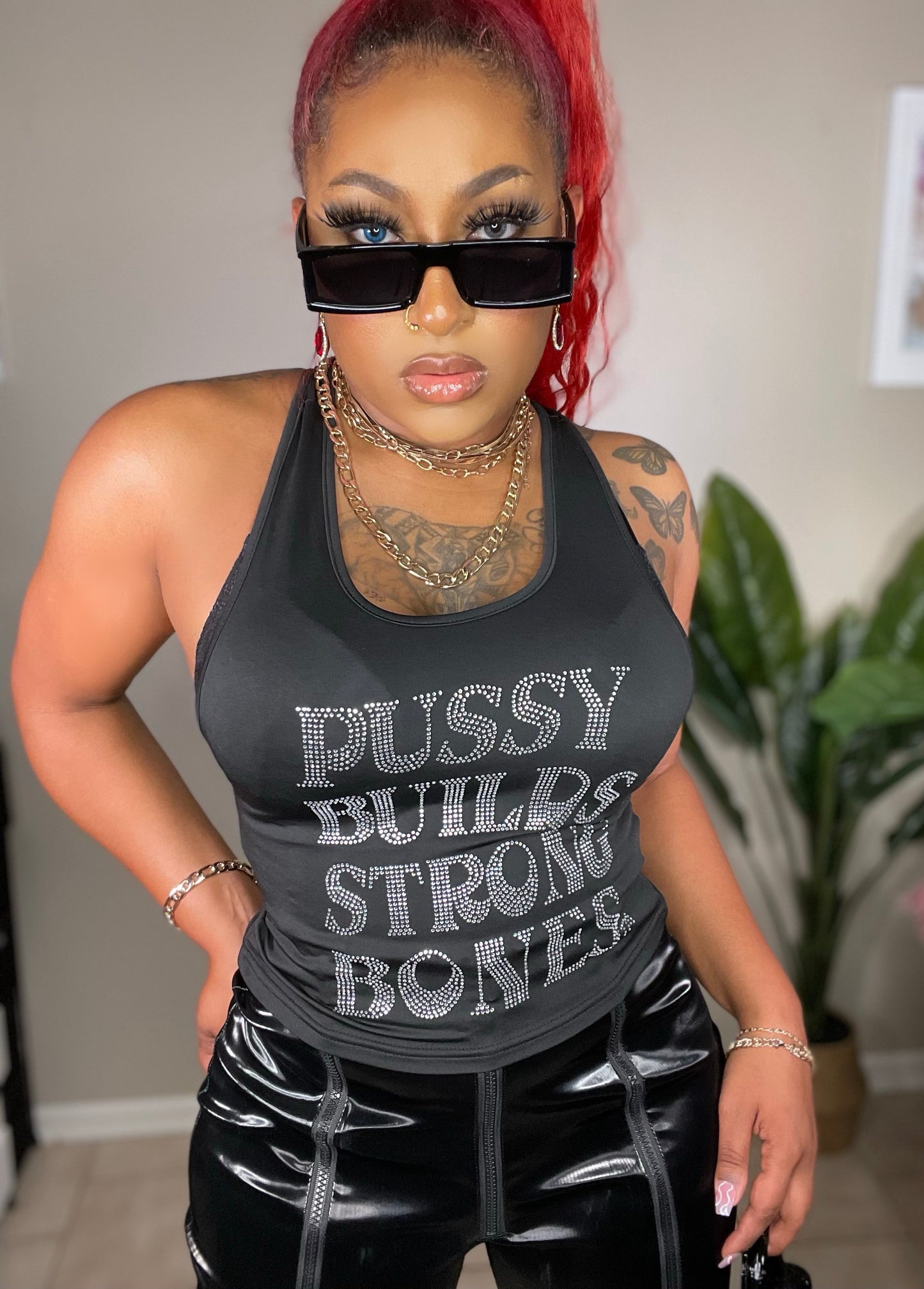 PU$$Y BUILDS STRONG BONES TOP